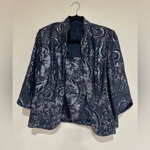 Women’s 2 piece garment. Blue and silver color. Pre owned
